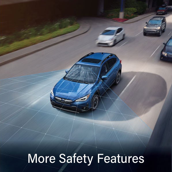 A Subaru Crosstrek in blue with the words &ldquo;More Safety Features&ldquo;. | Empire Subaru of Huntington in Huntington NY